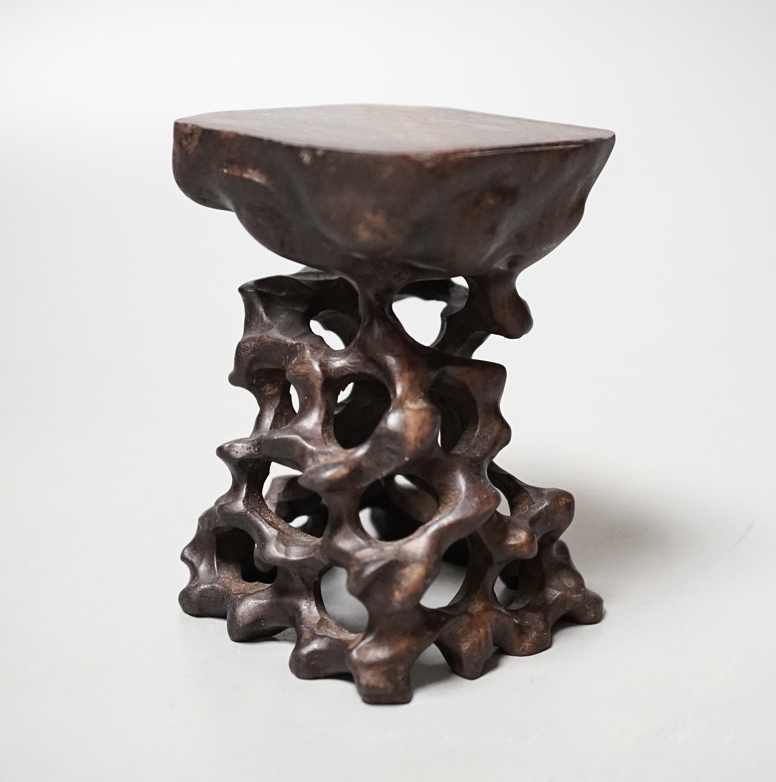 A Chinese carved hardwood stand 10.5cm